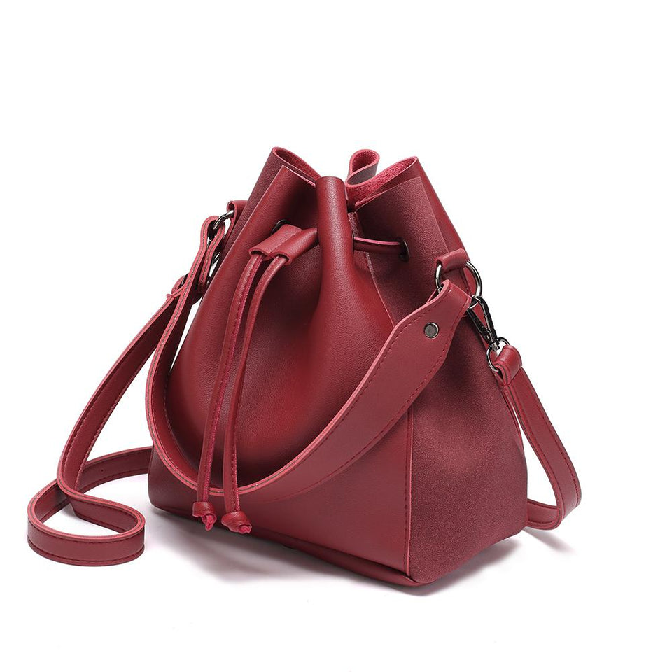 Faux suede leather bucket bag in Wine red