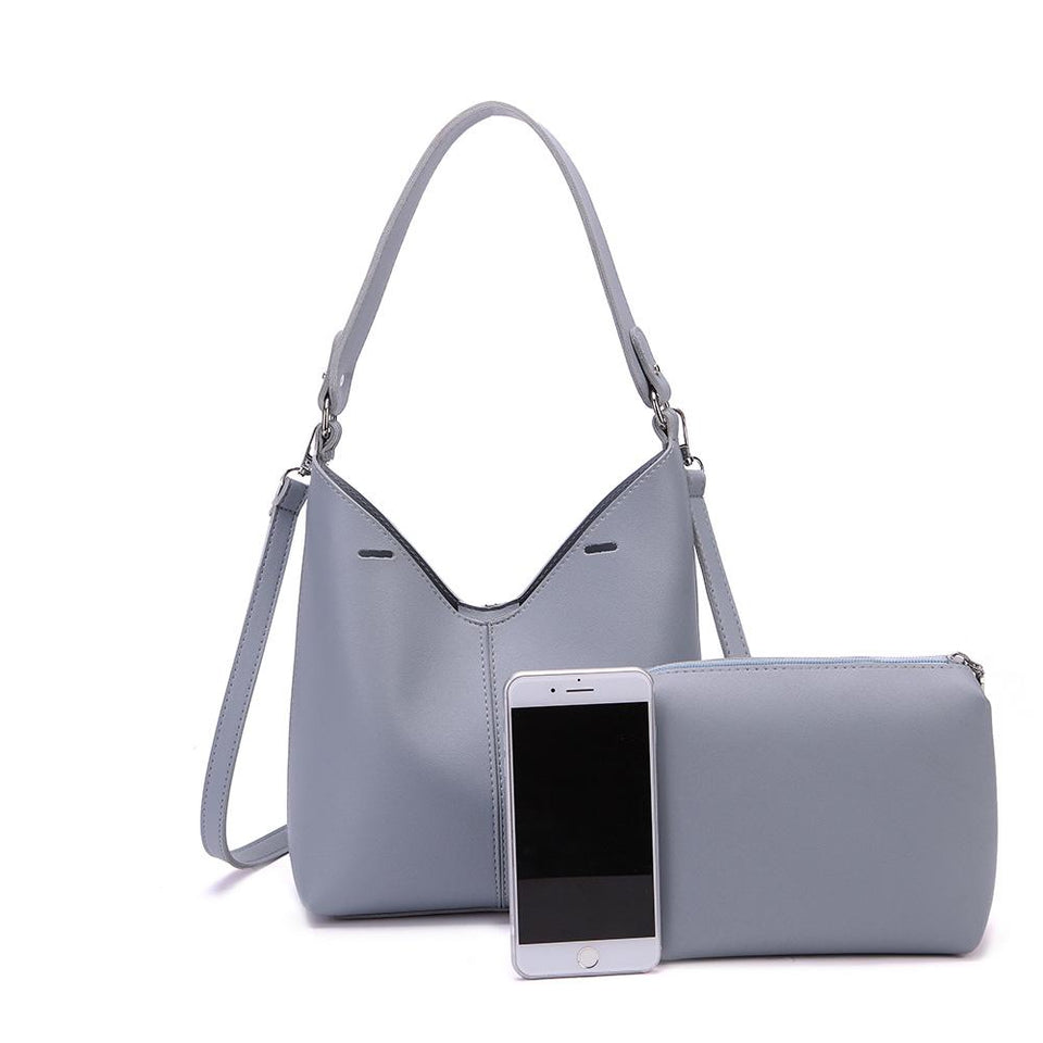 Cut-out sculptural faux leather 2-in-1 bag in Slate blue